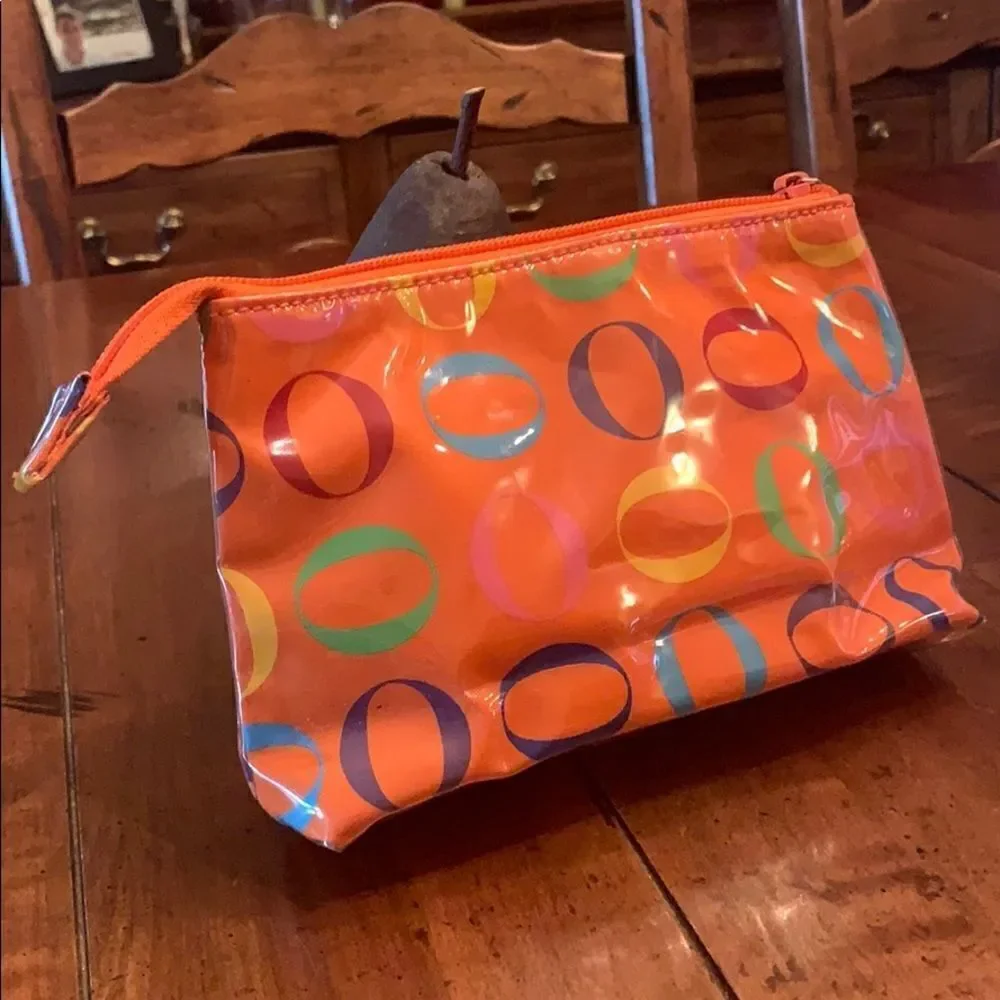 Never used Rare Oprah Orange O Logo Cosmetic bag.